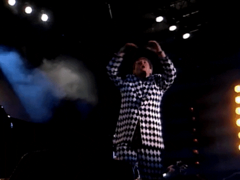 Elton John Bowing To Audience GIF