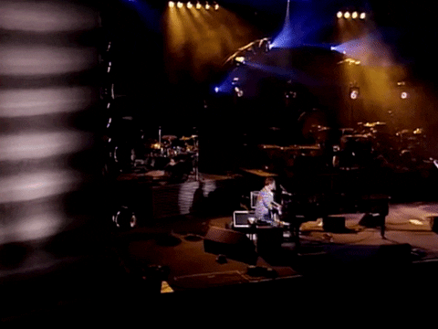 Elton John Kicking Chair While Playing Piano GIF