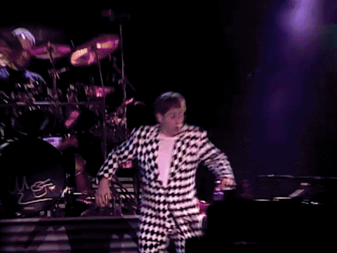 Elton John Lying Down On Piano GIF