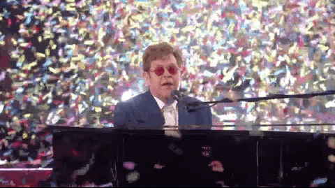 Elton John Performing With Falling Confetti GIF