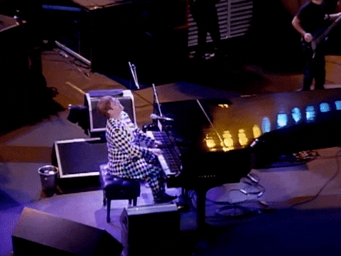 Elton John Playing Piano Aerial View GIF
