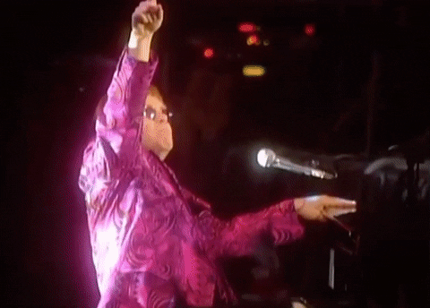 Elton John Raising One Finger GIF