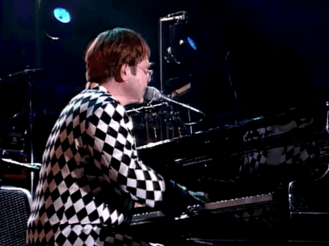 Elton John Singing On Microphone GIF