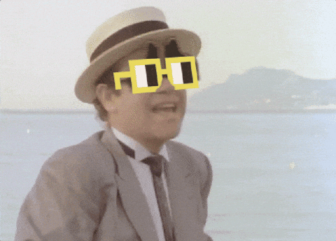 Elton John Wearing Different Eyeglasses GIF