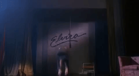 Elvira Doing A Backflip GIF