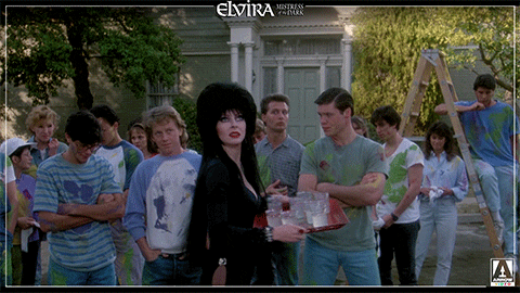Elvira Dropping A Tray Of Glasses GIF