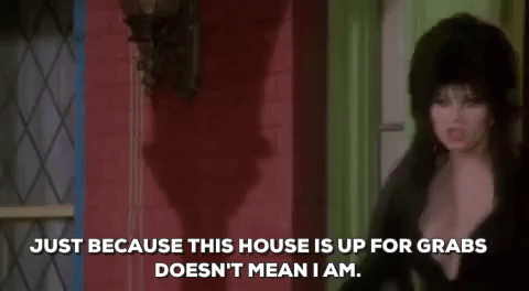 Elvira Speaking Angrily GIF