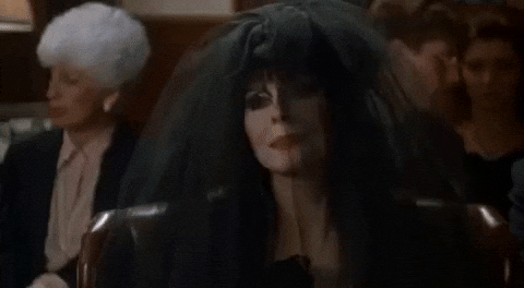 Elvira Wearing A Black Veil GIF