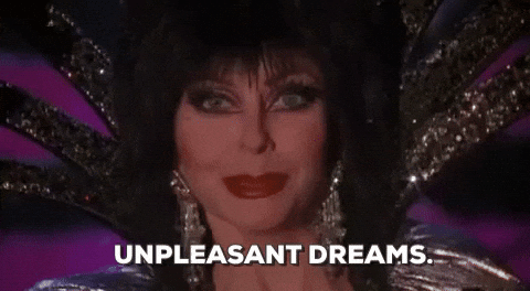 Elvira Winking Unpleasant Dreams GIF