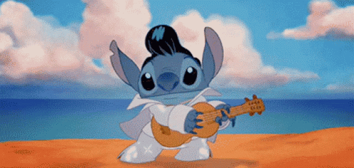 Elvis Cartoon Playing Guitar On Beach GIF