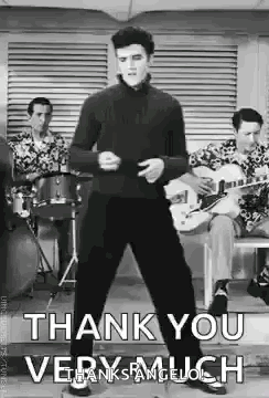 Elvis Presley Is Dancing In Front Of A Group Of Men Playing Drums And Guitars In A Black And White Photo . GIF