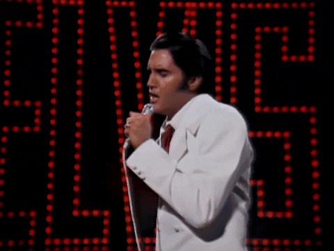 Elvis Singing On Stage Classic Look GIF