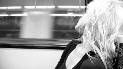 Embarrassed Woman Train Ride GIF