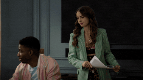 Emily In Paris Hit Someone's Face With Paper GIF