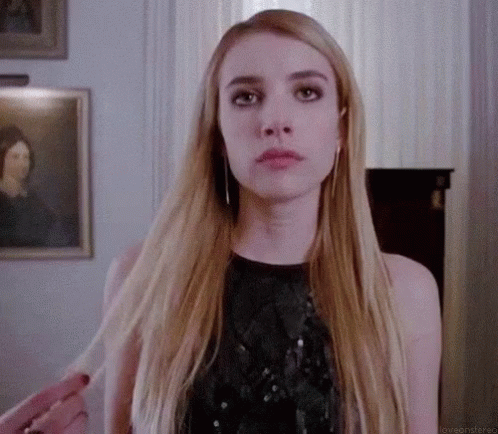Emma Roberts Strand Of Hair GIF