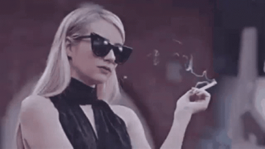 Emma Roberts Shrug Nothing GIF