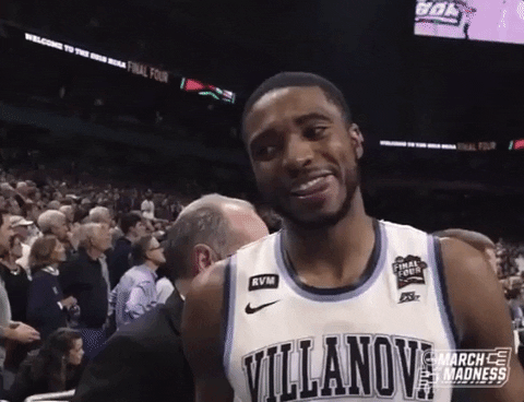 Emotional Mikal Bridges Tight Hugs GIF