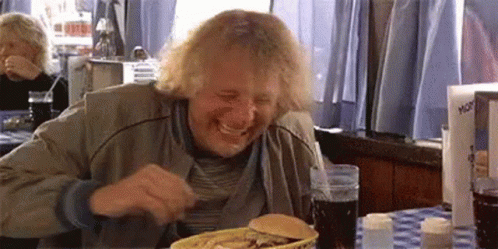 Emotionally Eating Too Much Dumb And Dumber Bathroom GIF