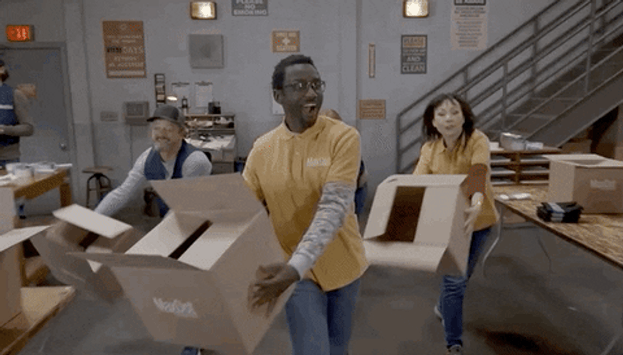 Employees Dancing Using Box As Props GIF
