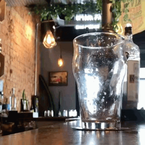 Empty Glass on Coaster at Restaurant Counter