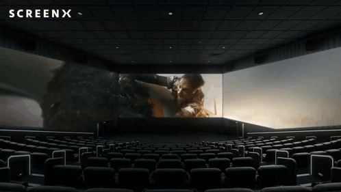Empty Movie Theater With Screen X Logo