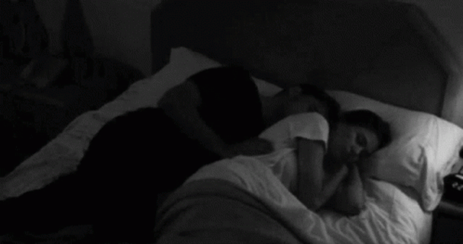 Endearing Couple Sweet Goodnight Hug In Bed GIF