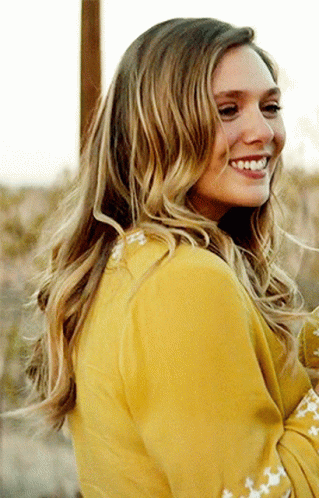 Enjoying Elizabeth Olsen Drink GIF