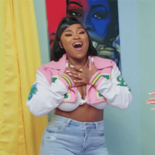 Erica Banks Looking Grateful And Flattered GIF