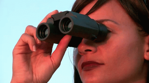 Erica De Casier Looking Thru Binoculars GIF