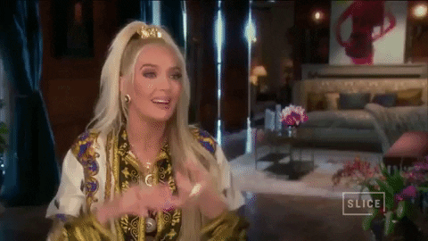 Erika Jayne Shoulder Shrug GIF