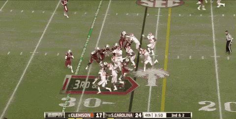 Espn Is Showing A Football Game Between Clemson And S. Carolina GIF