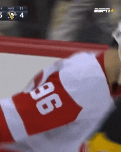Espn Is Showing A Hockey Game Between The Penguins And The Red Jackets GIF