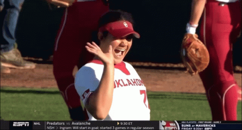 espn is showing a softball game between oklahoma and predators