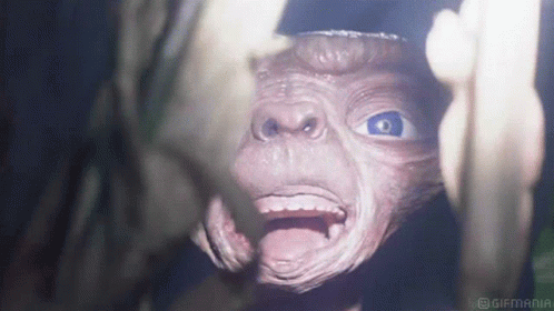 Et Tapping While Mouth Open GIF