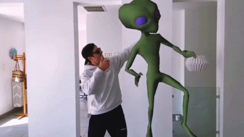 The Dancing Et With A Boy In A Hoodie GIF