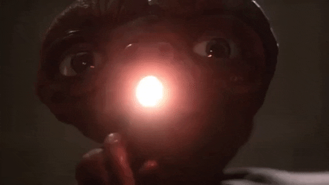 Et Has A Light On His Hands GIF