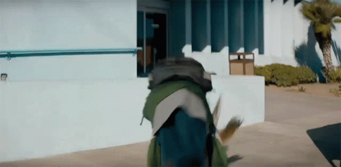 Evan Rachel Wood Sneaking In Building GIF