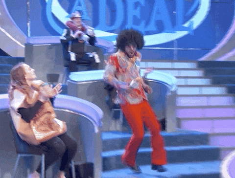 Excited Afro Haired Guy Quick Turn GIF