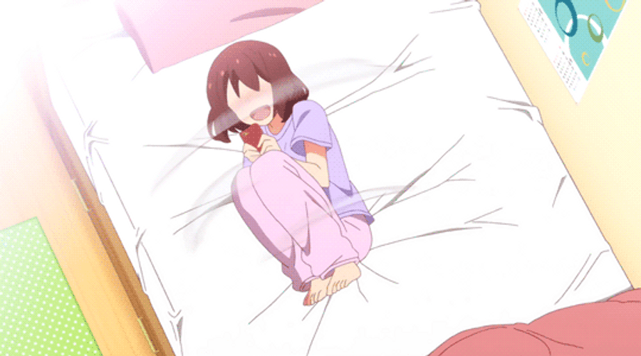 Excited Anime Girl Rapidly Rolling On Bed GIF