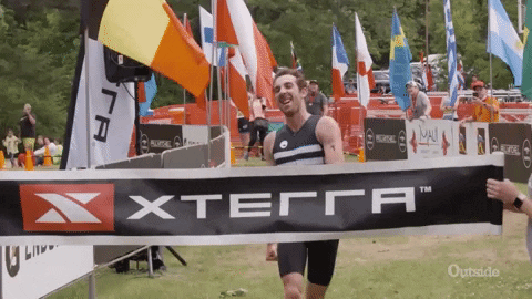 Excited Athlete Finish Line Win GIF