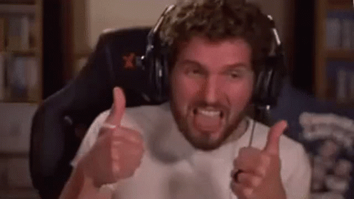 Excited Man Gives Thumbs Up GIF