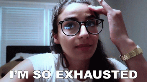 Exhausted Woman Wearing Glasses