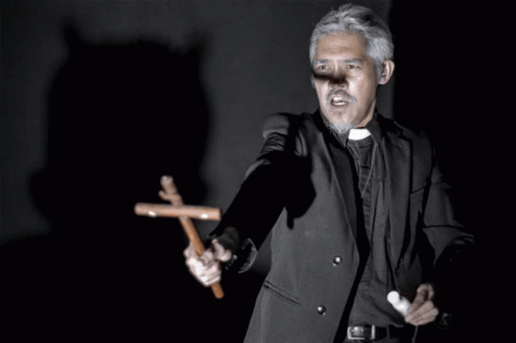 Exorcist Priest Cross Rolando Inocencio GIF