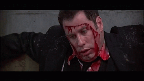 Face Off Scene John Travolta Bloody Face GIF