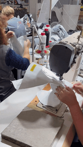 Factory Employers Making Boots GIF
