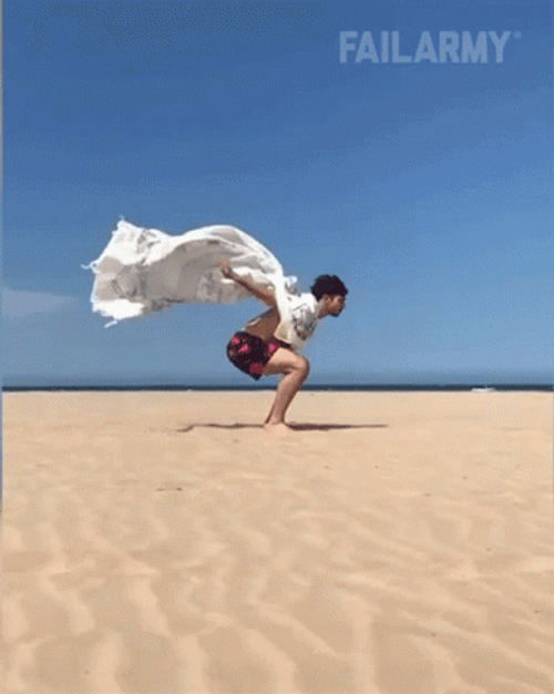 Failed Backflip In The Sand GIF