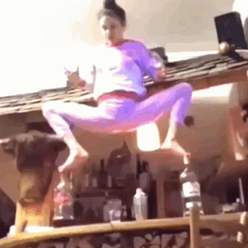 Balancing On Bottles Fails GIF