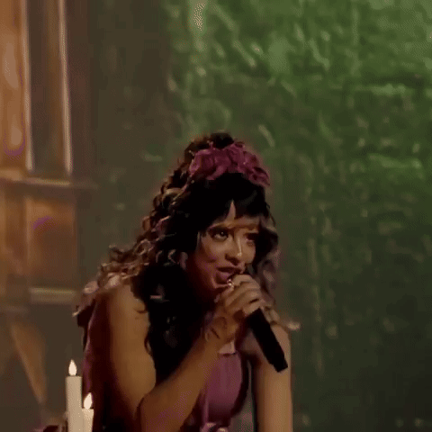 Fairy Woman With Flower Singing Into Microphone