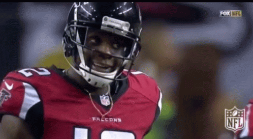 Falcons Player in Helmet and Number 12 Jersey