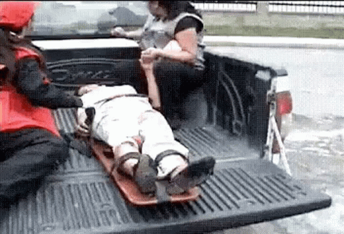 Falling On A Makeshift Ambulance Car GIF